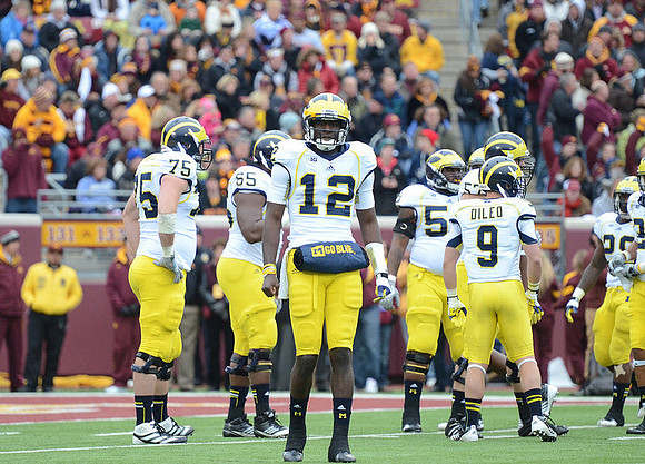 Michael Schofield (75), Patrick Omameh (65), Devin Gardner (12), Ricky Barnum (52), Drew Dileo (9), and Fitzgerald Toussaint (28)