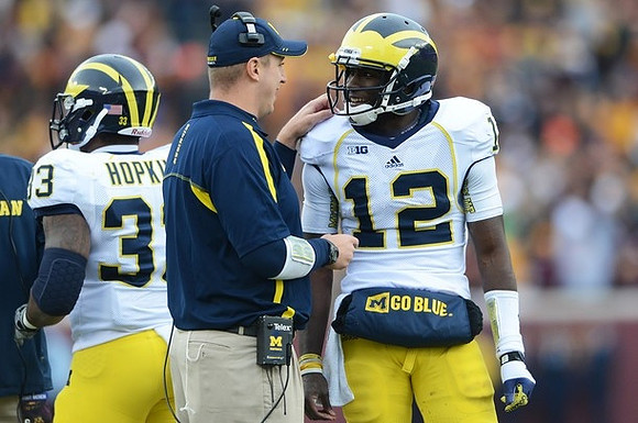 Stephen Hopkins (33) and Devin Gardner (12)