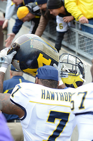Brandin Hawthorne (7), Frank Clark (57), and The Little Brown Jug