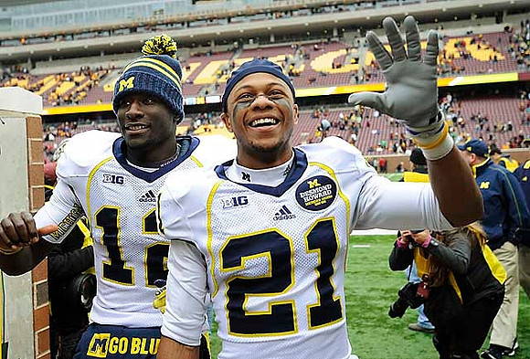 Devin Gardner (12) and Roy Roundtree (21)