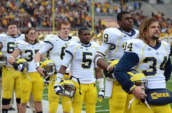 Brendan Gibbons (34), Devin Funchess (19), Courtney Avery (5), Brian Cleary (6), and Joe Bolden (35)