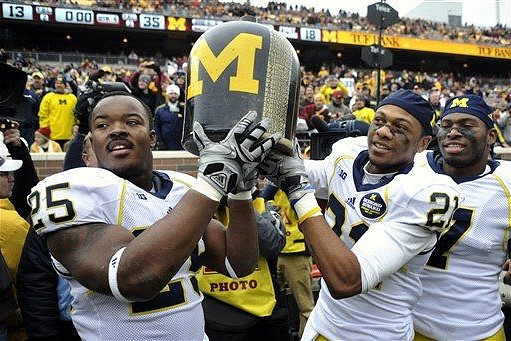 Kenny Demens (25), The Little Brown Jug, Roy Roundtree (21), and Brandin Hawthorne (7)