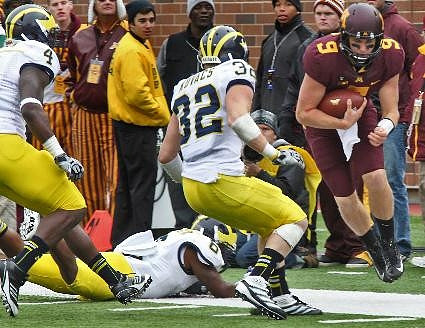 Cameron Gordon (4), Jordan Kovacs (32), and Raymon Taylor (6)