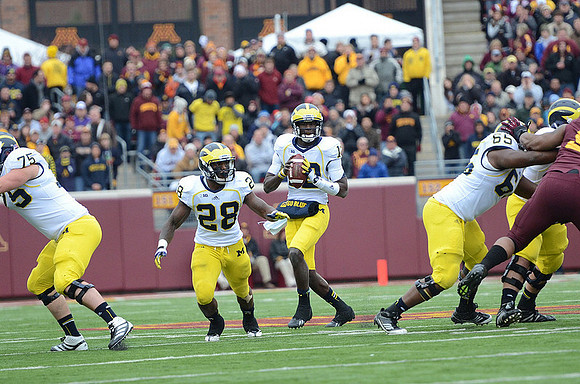 Michael Schofield (75), Fitzgerald Toussaint (28), Devin Gardner (12), and Patrick Omameh (65)