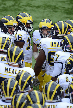 Elliott Mealer (57), Denard Robinson (16), Patrick Omameh (65), and Steve Wilson (20)