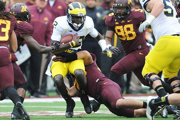Devin Gardner (12) and Elliott Mealer (57)