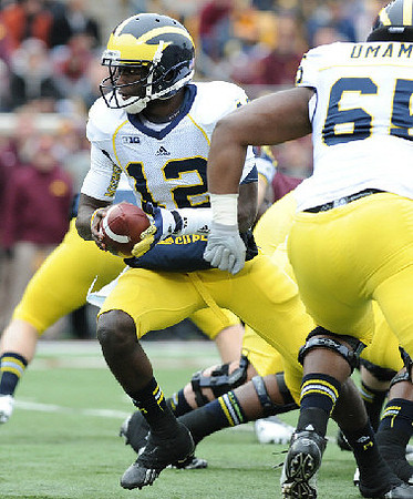 Devin Gardner (12) and Patrick Omameh (65)