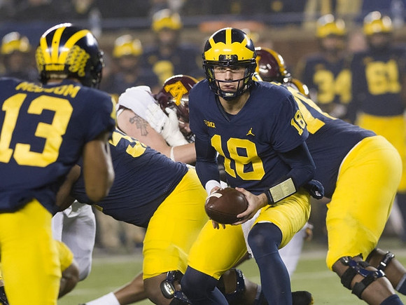 Eddie McDoom (13) and Brandon Peters (18)