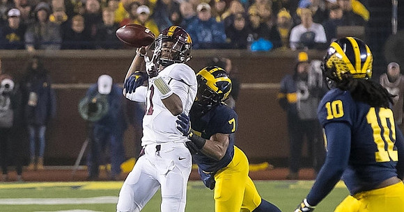 Khaleke Hudson (7) and Devin Bush (10)