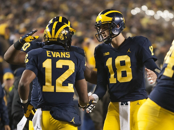 Khalid Hill (80), Chris Evans (12), and Brandon Peters (18)
