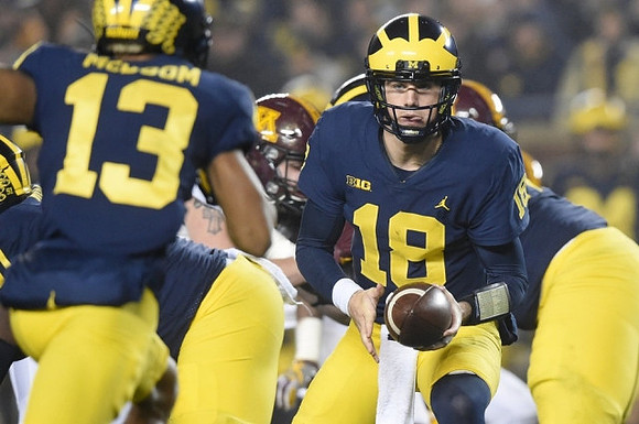 Eddie McDoom (13) and Brandon Peters (18)