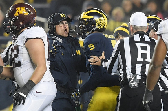 Jim Harbaugh and Mike McCray (9)