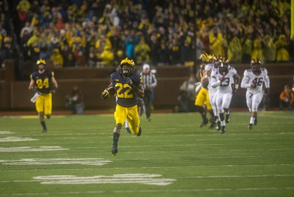 Sean McKeon (84) and Karan Higdon (22)