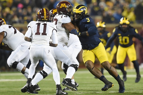 Rashan Gary (3) and Devin Bush (10)