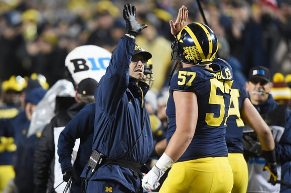 Jim Harbaugh and Patrick Kugler (57)