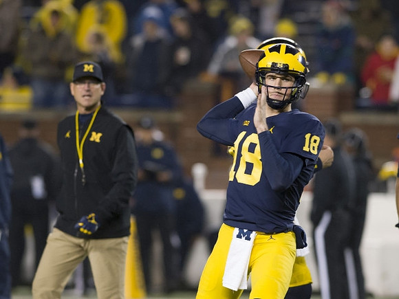 Jim Harbaugh and Brandon Peters (18)