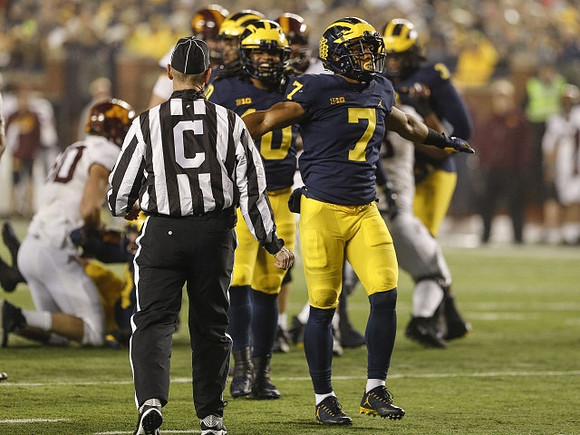 Devin Bush (10) and Khaleke Hudson (7)