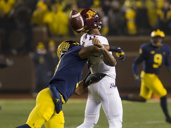 Khaleke Hudson (7) and Mike McCray (9)