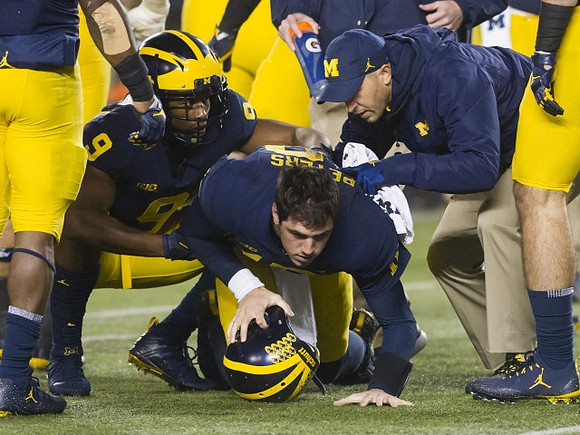 Donovan Peoples-Jones (9) and Brandon Peters (18)