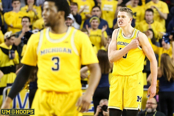 Zavier Simpson (3) and Moritz Wagner (13)