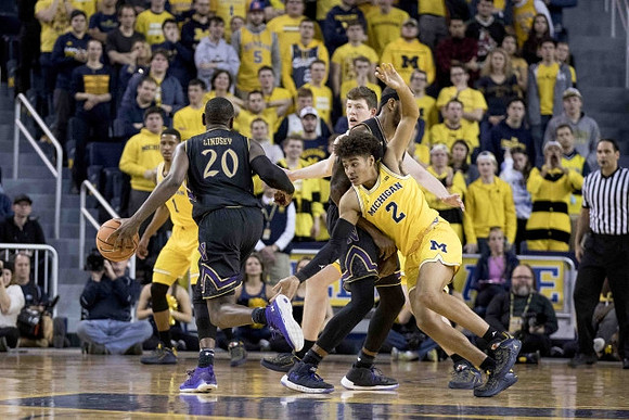 Charles Matthews (1) and Jordan Poole (2)