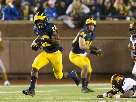 Karan Higdon (22) and Sean McKeon (84)