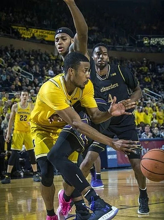 Duncan Robinson (22) and Muhammad-Ali Abdur-Rahkman (12)