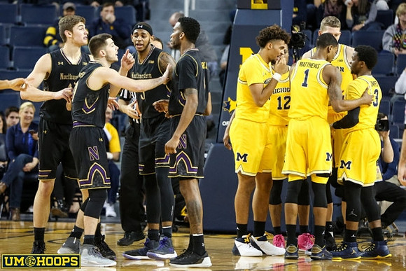 Isaiah Livers (4), Muhammad-Ali Abdur-Rahkman (12), Charles Matthews (1), Moritz Wagner (13), and Zavier Simpson (3)