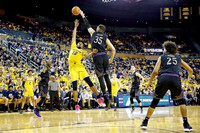 Jordan Poole (2), Muhammad-Ali Abdur-Rahkman (12), and Duncan Robinson (22)