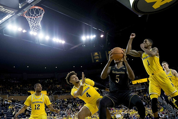 Muhammad-Ali Abdur-Rahkman (12), Isaiah Livers (4), Charles Matthews (1), and Moritz Wagner (13)