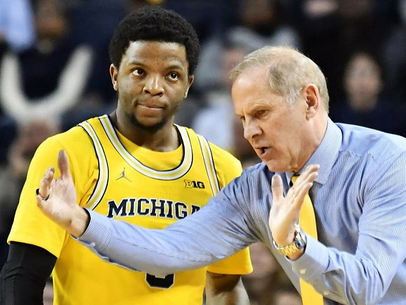Zavier Simpson (3) and John Beilein