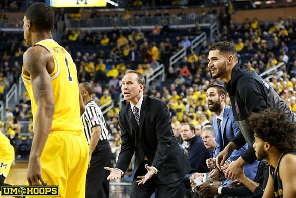 Charles Matthews (1) and Northwestern Head Coach Chris Collins