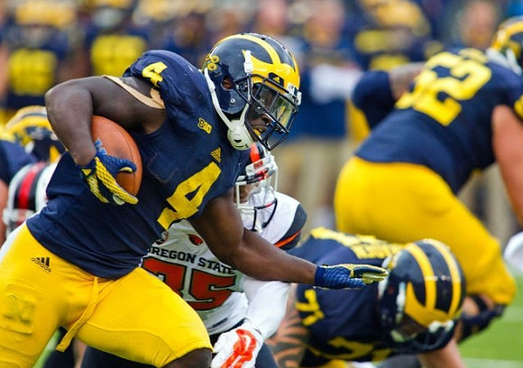 De'Veon Smith (4) Ben Braden (71), and Mason Cole (52)