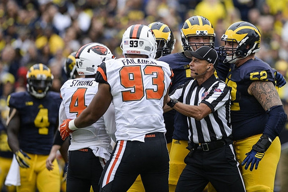 De'Veon Smith (4) and Mason Cole (52)