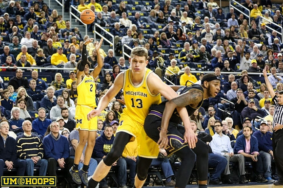 Jordan Poole (2) and Moritz Wagner (13)