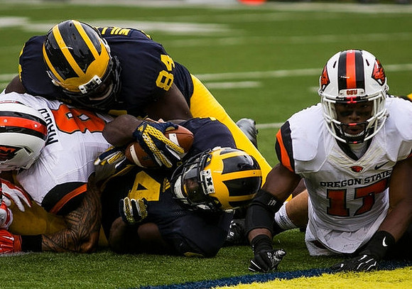 A.J. Williams (84) and De'Veon Smith (4)
