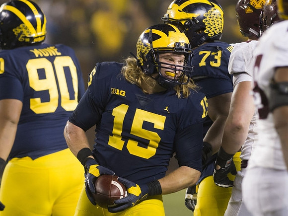 Bryan Mone (90), Chase Winovich (15), and Maurice Hurst (73)