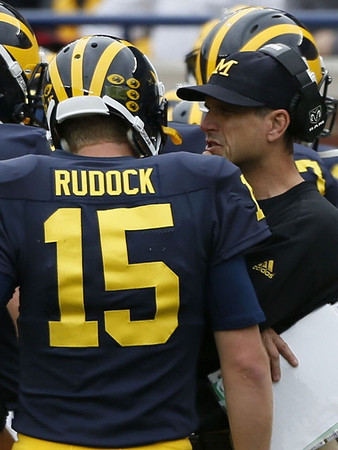 Jake Rudock (15) and Jim Harbaugh