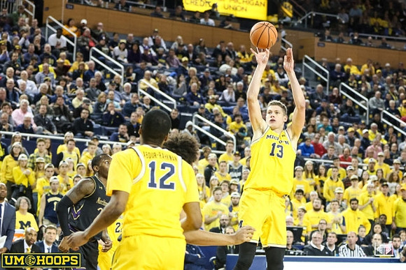 Muhammad-Ali Abdur-Rahkman (12) and Moritz Wagner (13)