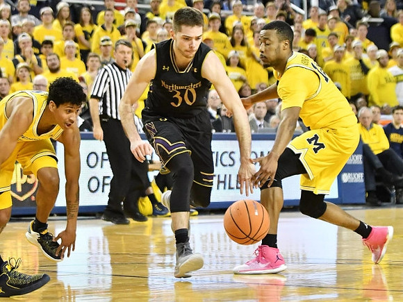 Eli Brooks (55) and Muhammad-Ali Abdur-Rahkman (12)