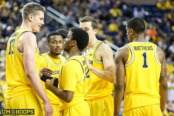 Moritz Wagner (13), Muhammad-Ali Abdur-Rahkman (12), Zavier Simpson (3), Duncan Robinson (22), and Charles Matthews (1)