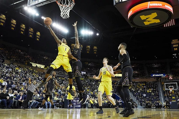 Charles Matthews (1) and Jon Teske (15)