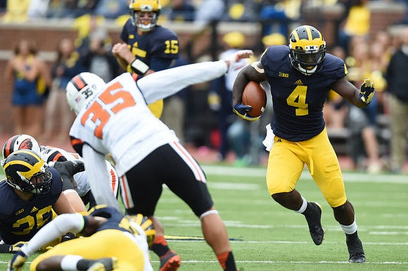 Joe Kerridge (36), Jake Rudock (15), and De'Veon Smith (4)