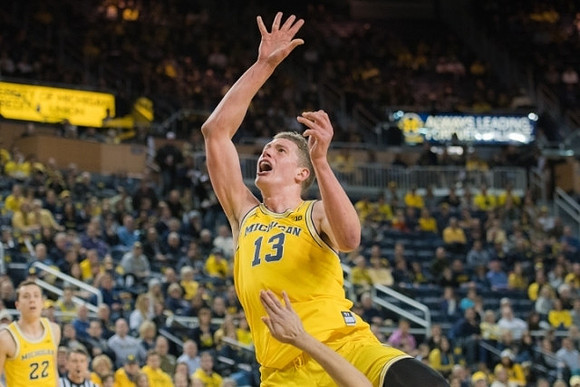 Moritz Wagner (13) and Duncan Robinson (22)