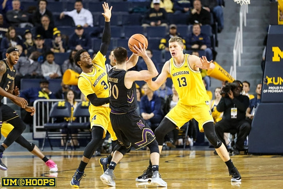 Zavier Simpson (3) and Moritz Wagner (13)
