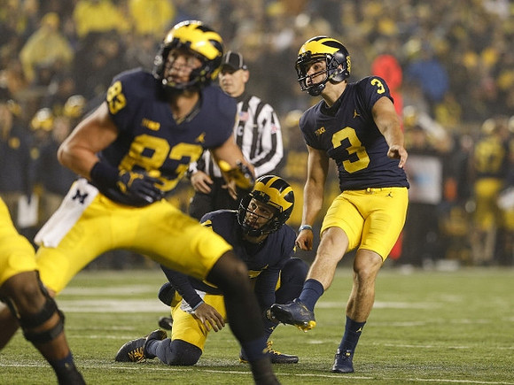 Zach Gentry (83), Garrett Moores (15), and Quinn Nordin (3)