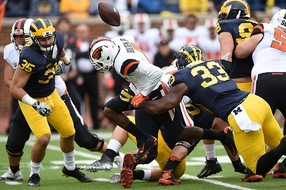 Joe Bolden (35), Taco Charlton (33), and Matthew Godin (99)