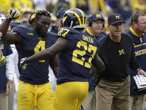 De'Veon Smith (4), Derrick Green (27), and Jim Harbaugh