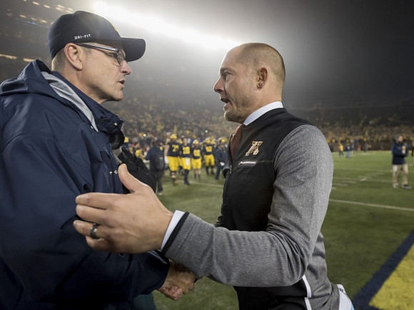 Jim Harbaugh and Minnesota Head Coach P. J. Fleck