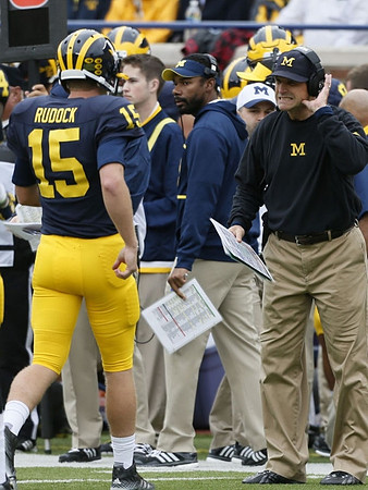 Jake Rudock (15) and Jim Harbaugh